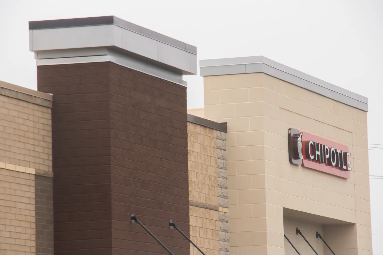 strip mall with woodgrain finish